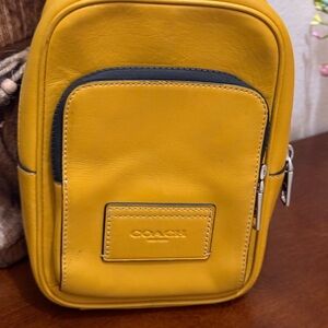 Coach Men's Leather Racer Sling  in Mustard Yellow with Black Trim